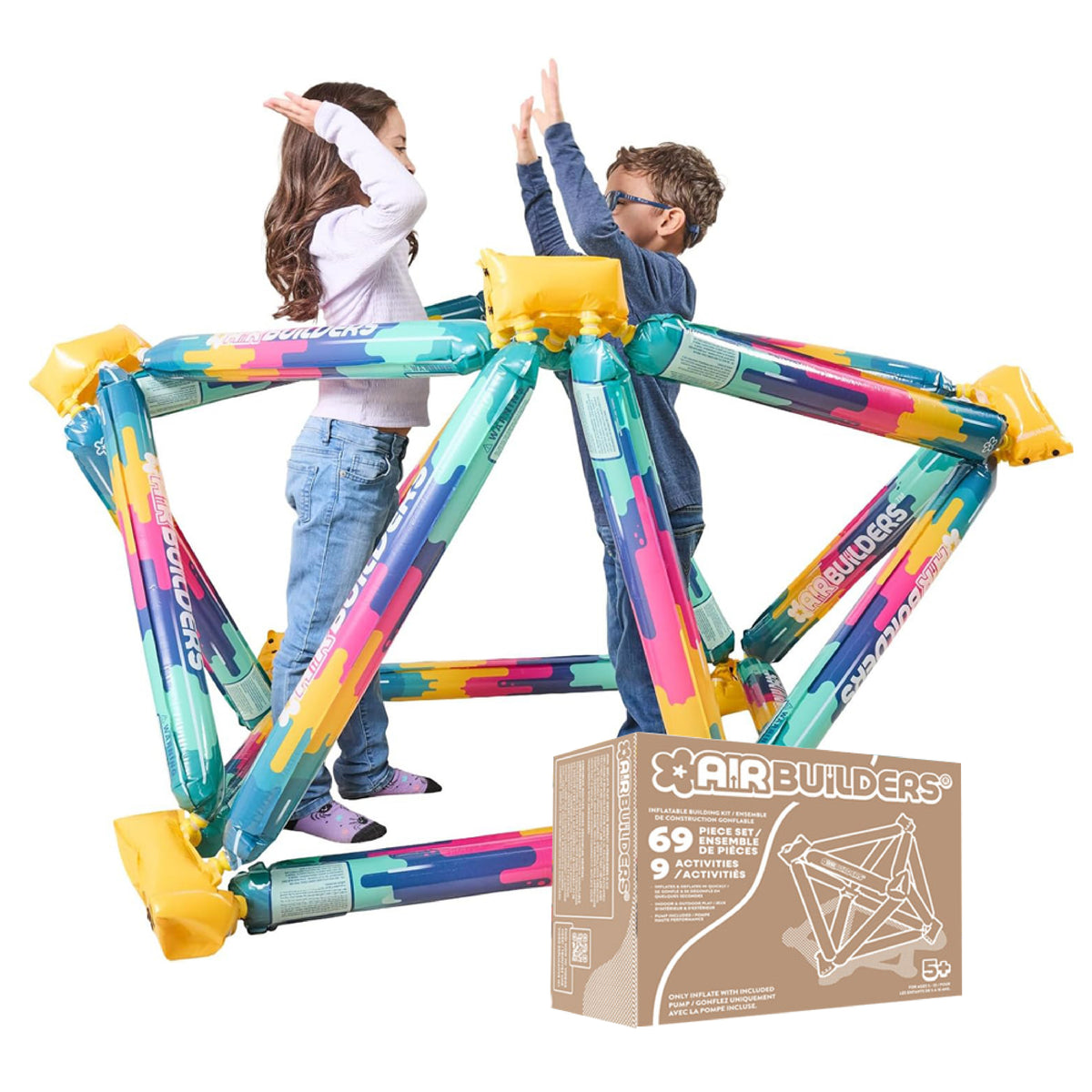Two children play inside an inflated AirBuilders structure. AirBuiders 69 piece set box sits in front on white background.