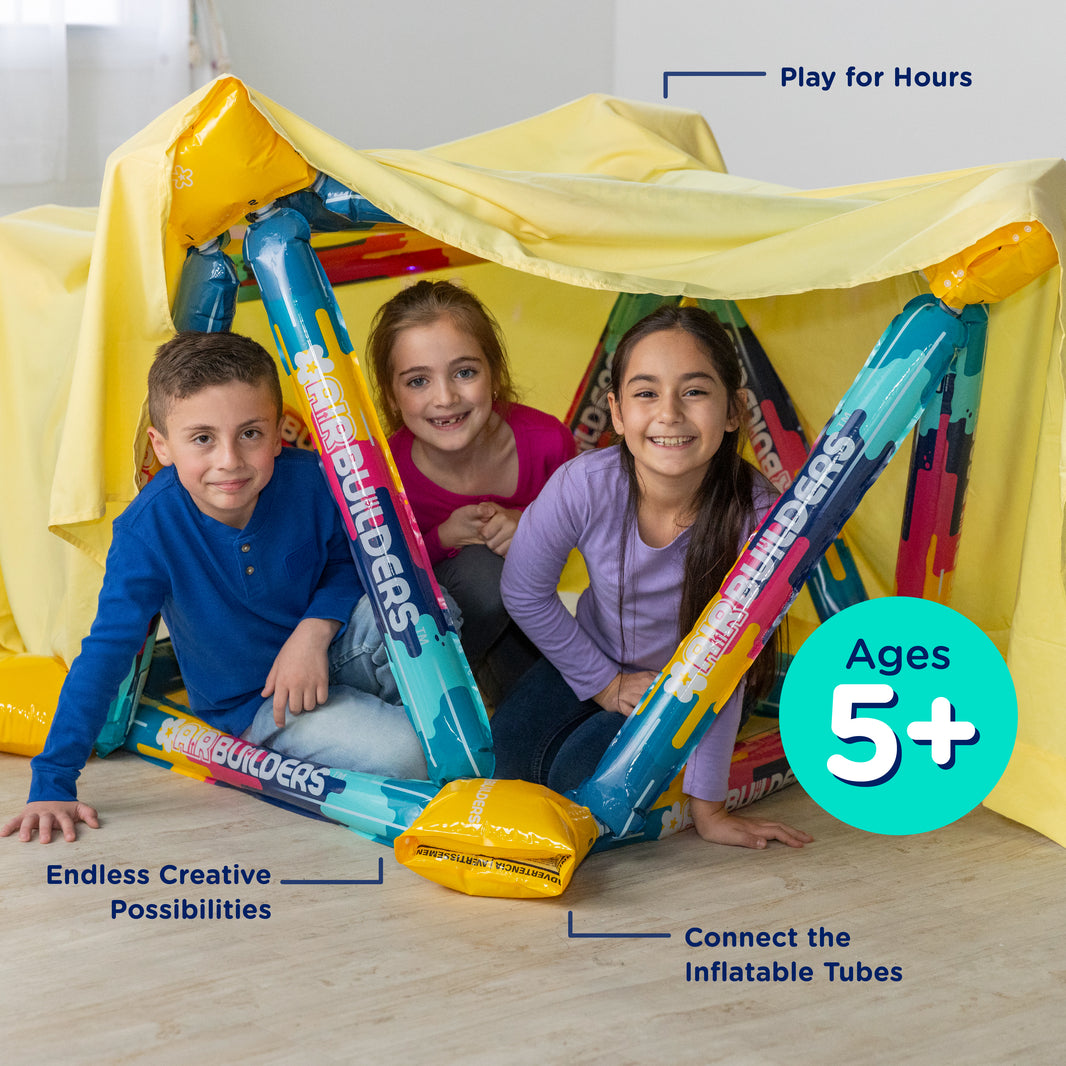 Three children play inside a colorful inflatable play tent with a yellow fabric cover. Product callouts include, play for hours, endless creative possibilities, connect inflatable tubes, and ages 5+.