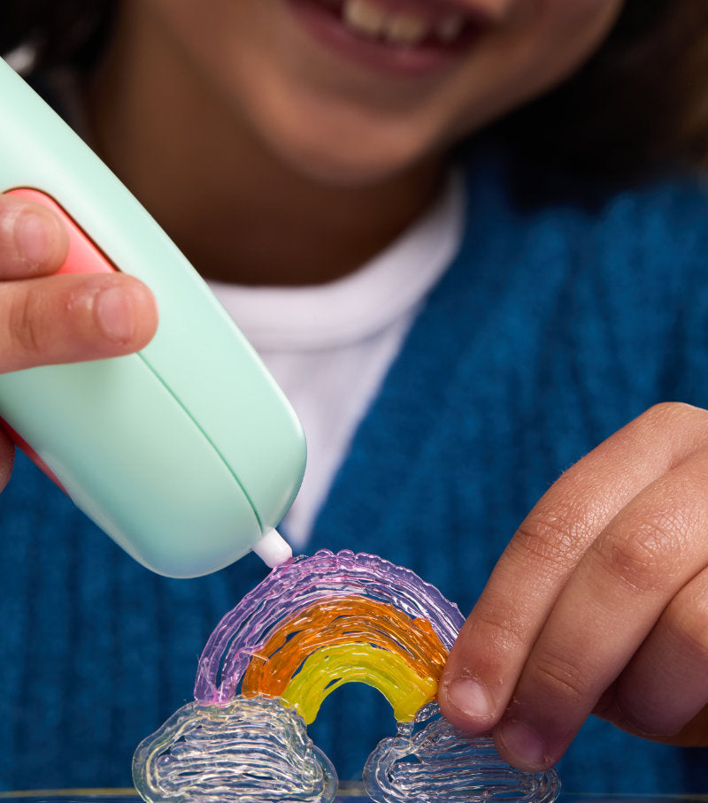 Close up of girl using 3Doodler Candy pen